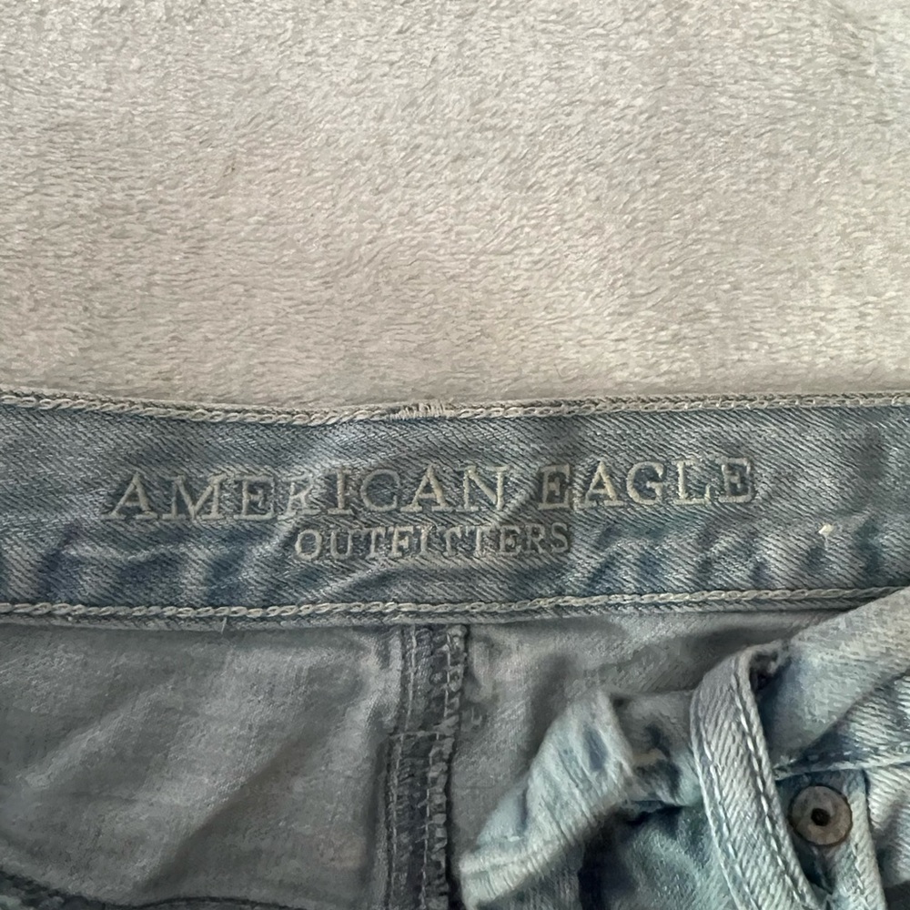 American Eagle Outfitters Light Wash Distressed Denim Cutoff Shorts - Picture 3 of 12
